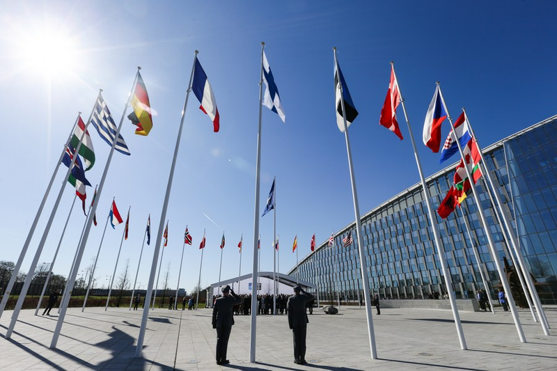 Des délégués assistent à la cérémonie d'adhésion de la Finlande à l'OTAN au siège de l'organisation à Bruxelles, en Belgique, le 4 avril 2023. (Xinhua/Zheng Huansong)