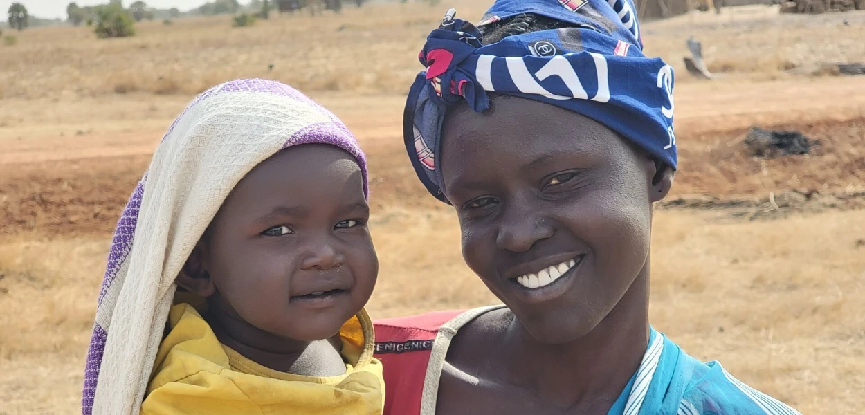 Avec son bébé, l’esclave libérée Abuk Angok Chamiir vit de nouveau dans son pays natal, le Soudan du Sud. csi