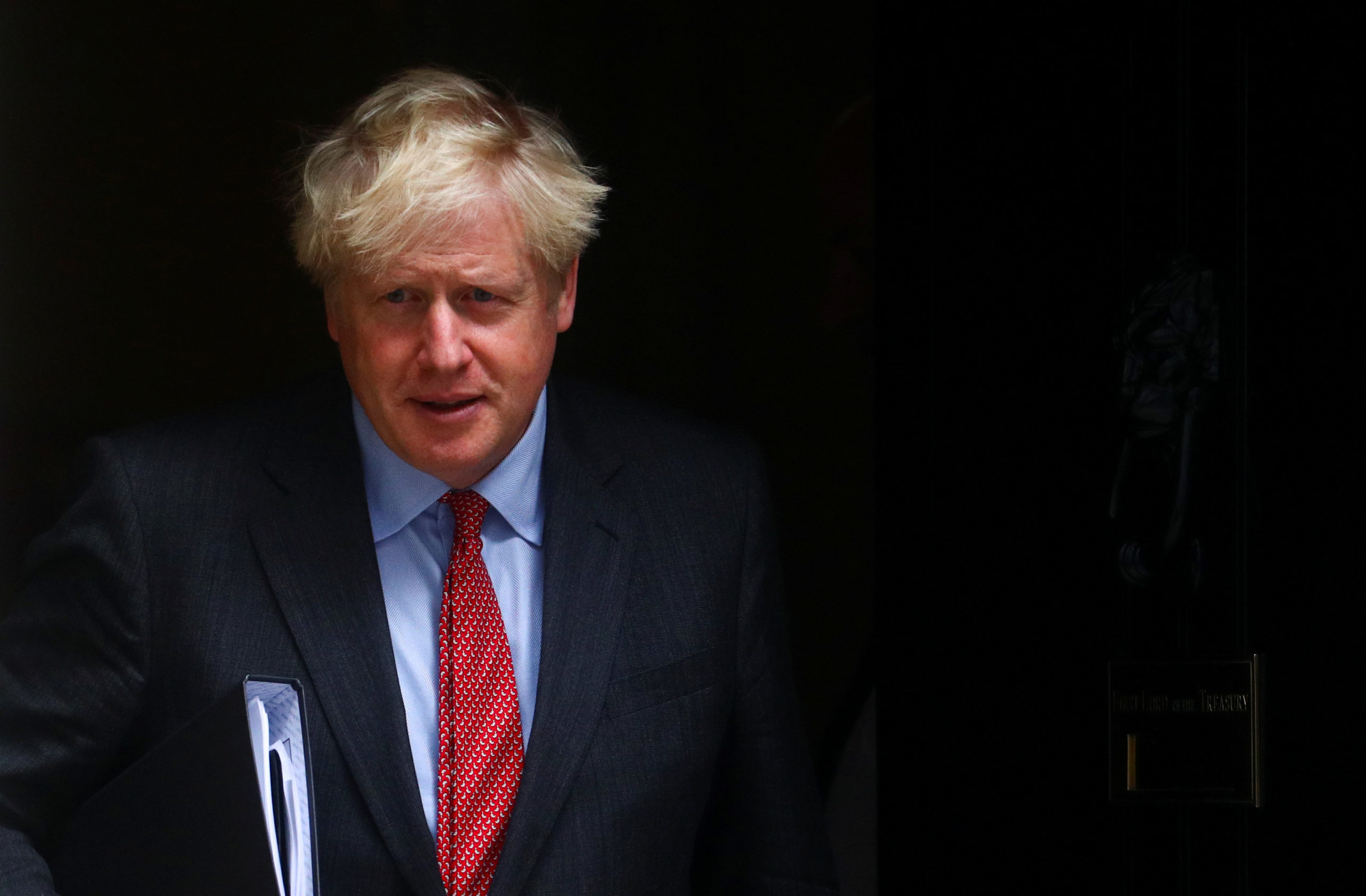 Coronavirus: Boris Johnson annonce six mois de restrictions