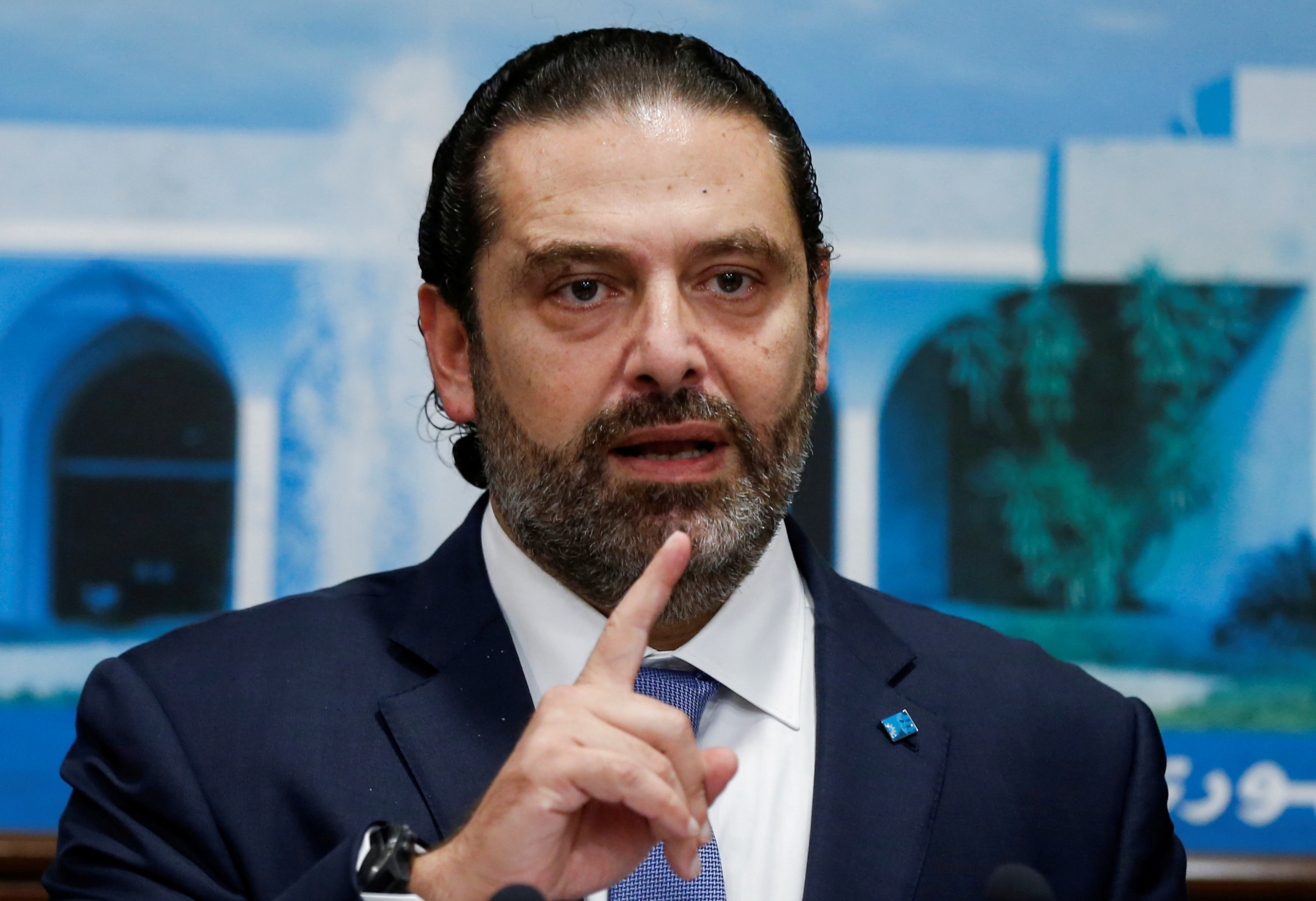 Saad Hariri (en photo) est disposé à rester Premier ministre à condition que le futur gouvernement comprenne des technocrates capables de mettre rapidement en oeuvre les réformes économiques jugées indispensables au relèvement du Liban, a déclaré mercredi une source proche du dossier. /Photo prise le 21 octobre 2019/REUTERS/Mohamed Azakir