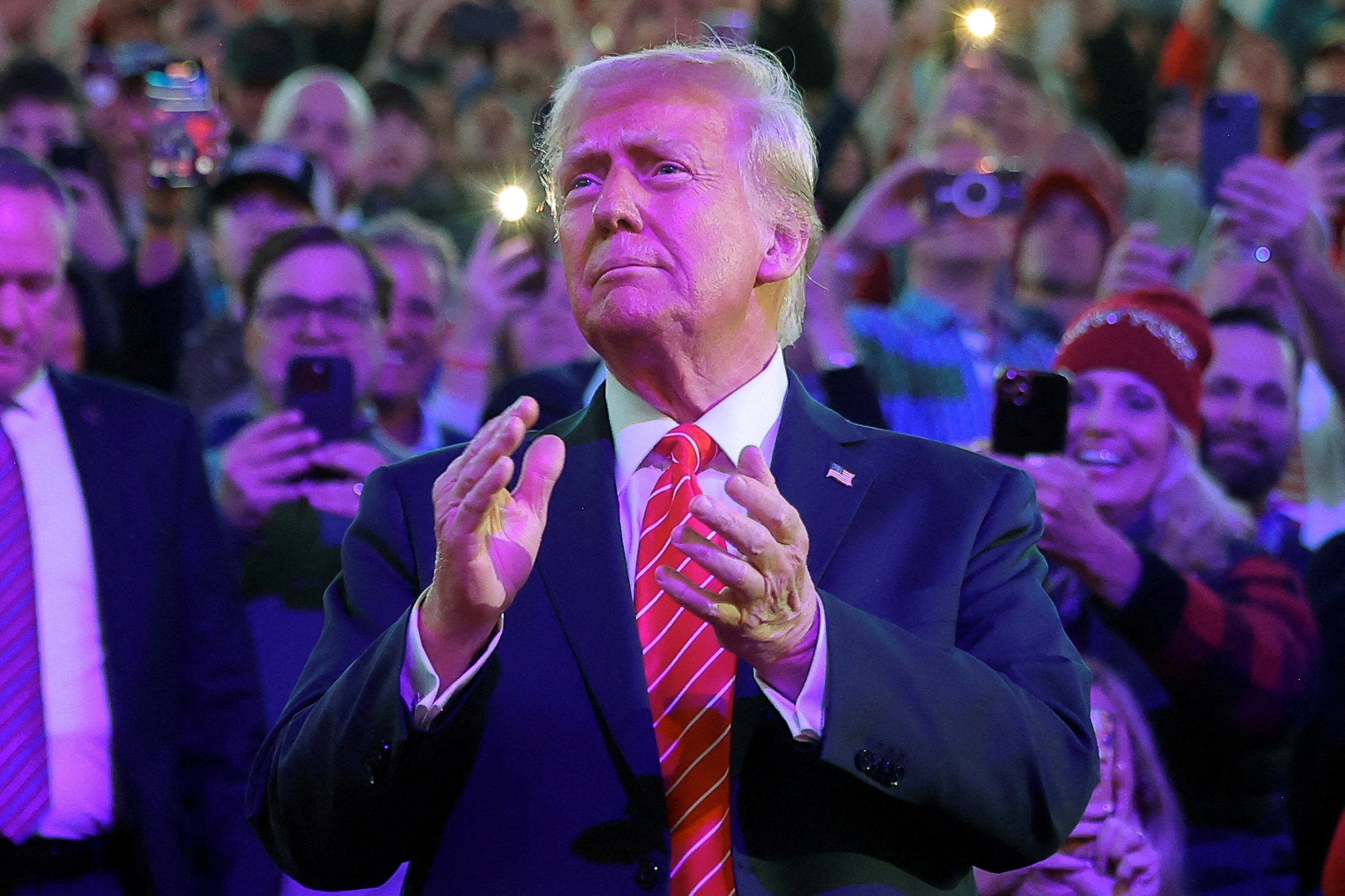 Le président élu des États-Unis, Donald Trump, arrive pour assister à un rassemblement la veille de son investiture prévue pour un second mandat, à Washington, États-Unis. /Photo prise le 19 janvier 2025/REUTERS/Carlos Barria/Photo d'archives